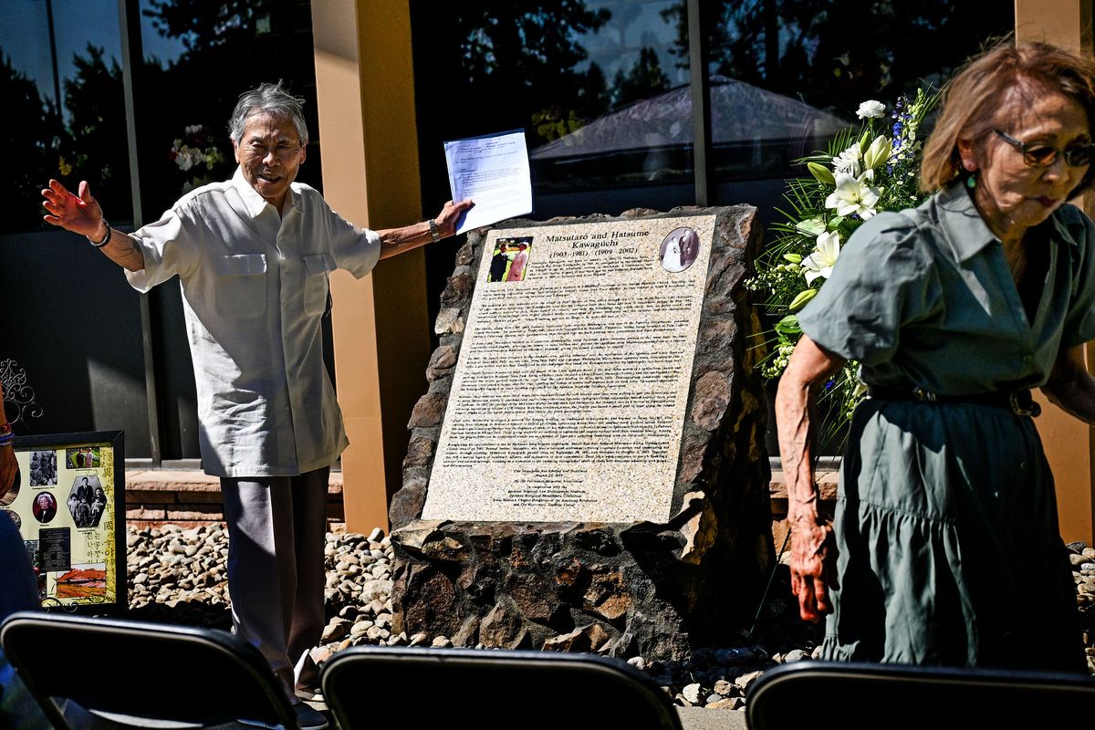 Matsutaro and Hatsume Kawaguchi’s son Harold Kawaguchi helped unveil the memorial dedicated to his parents Friday at Fairmount Memorial Park in Spokane. They moved to Spokane in 1945, leasing farmland near the confluence of the Spokane and Little Spokane rivers at Nine Mile Falls. Over time, Matsutaro developed a passion for bonsai, drawing on traditional techniques he learned in Japan. In 1969, after retiring from farming, he dedicated himself to formal gardening, cultivating bonsai trees that adorned many gardens across Spokane.  (Kathy Plonka/The Spokesman-Review)