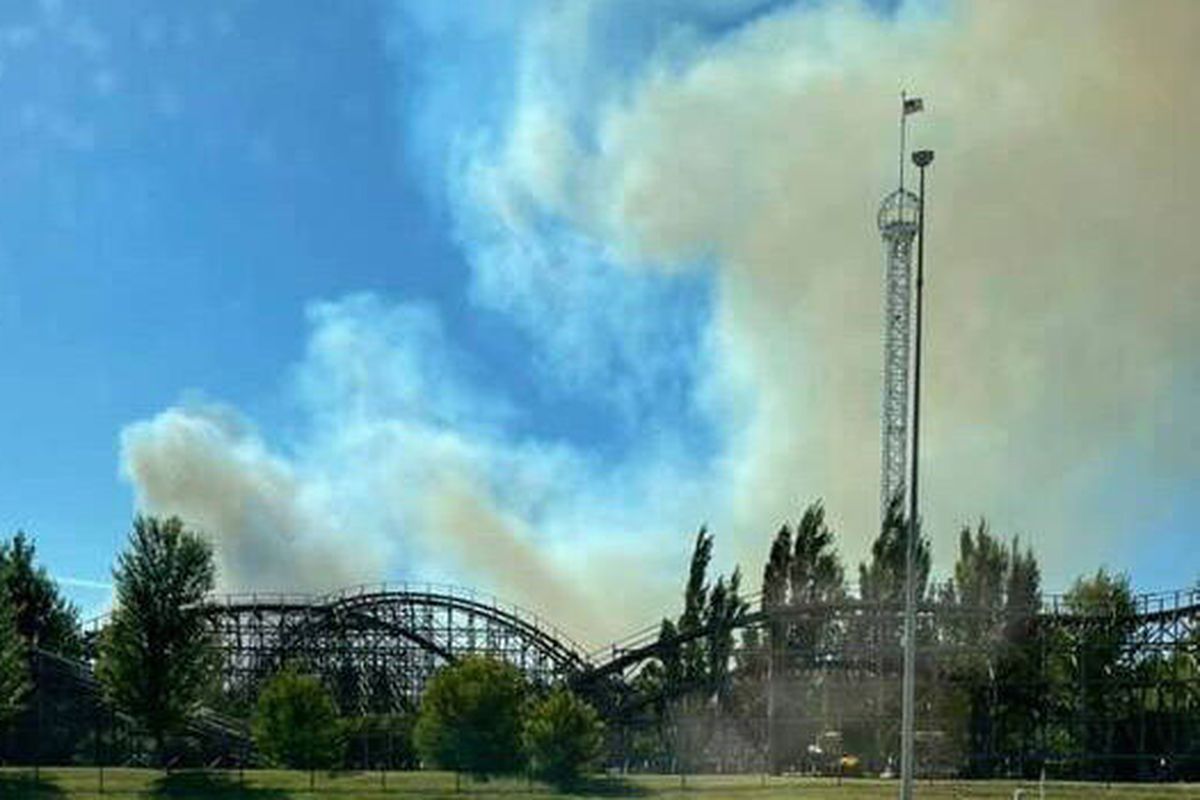 A fast-growing fire burns about 1.5 miles west of Silverwood Theme Park. The fire forced the park to evacuate.  (Courtesy of Chud Wendle)