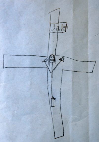 This drawing, released by Chester Johnson, of Taunton, shows a sketch of Jesus on the cross created by his son as part of school work, in Taunton, Mass. on Tuesday, Dec. 15, 2009. The 8-year-old boy was sent home from school and ordered to undergo a psychological evaluation after he was asked to make a Christmas drawing and came up with what appeared to be a stick figure of Jesus on a cross, the child's father said Tuesday. (Charles Krupa / Associated Press)