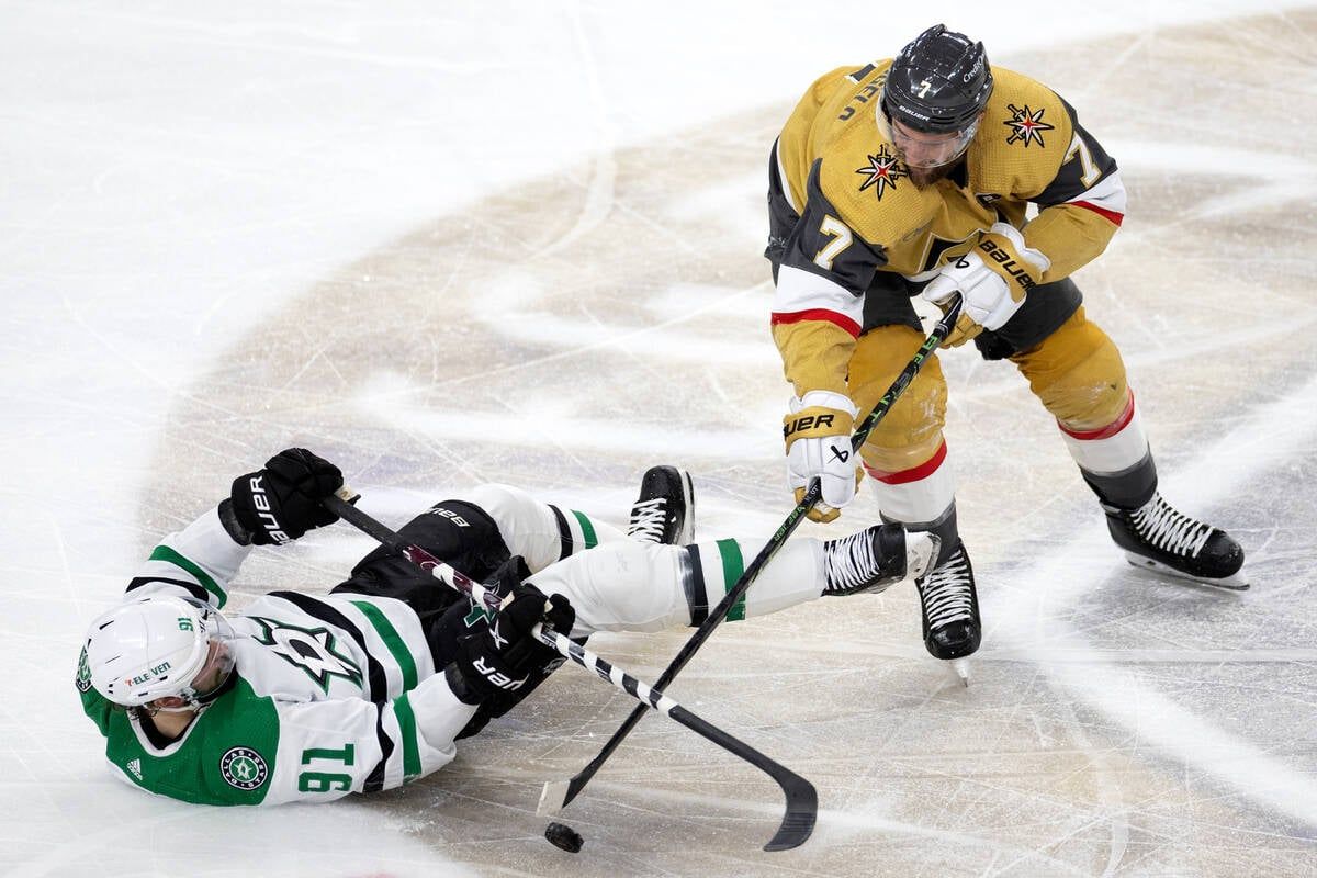 Golden Knights defenseman Alex Pietrangelo, right, and Dallas’ Tyler Seguin battle for the puck during Game 5 of the Western Conference final at T-Mobile Arena on May 27 in Las Vegas.  (Ellen Schmidt)