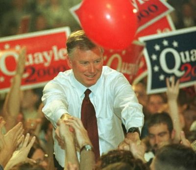 In this April 14, 1999, file photo, Dan Quayle shakes hands with supporters in his hometown of Huntington, Ind., Wednesday, following his formal announce that he is a candidate for the Republican presidential nomination. He had learned to spell 