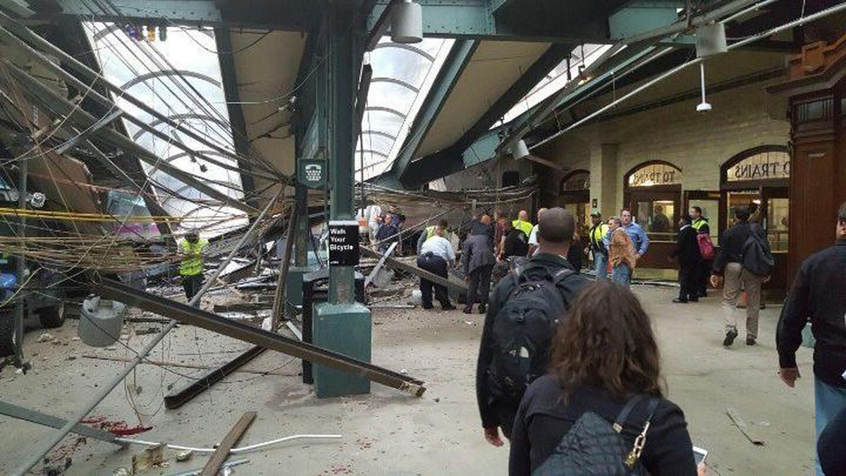 This photo provided by Ian Samuel shows the scene of a train crash in Hoboken, N.J., on Thursday, Sept. 29, 2016. A commuter train barreled into the New Jersey rail station during the Thursday morning rush hour, causing serious damage. The train came to a halt in a covered area between the station