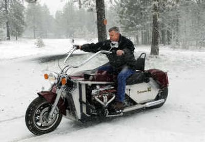 Roger Pritt shows one of his custom motorcycles in the snow at his home near Cheney on March 26. The bike is powered by a small-block V-8 engine.
(Photos by DAN PELLE / The Spokesman-Review)