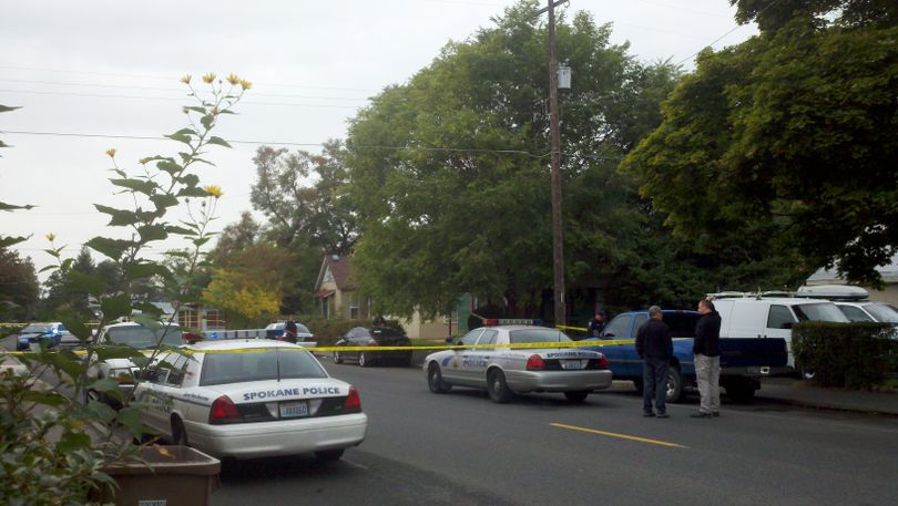 Spokane police on scene of an attempted murder/suicide at the green house, located in the 3100 block of East 5th Avenue, on Monday, Oct. 10, 2011. (Meghann Cuniff / The Spokesman-Review)