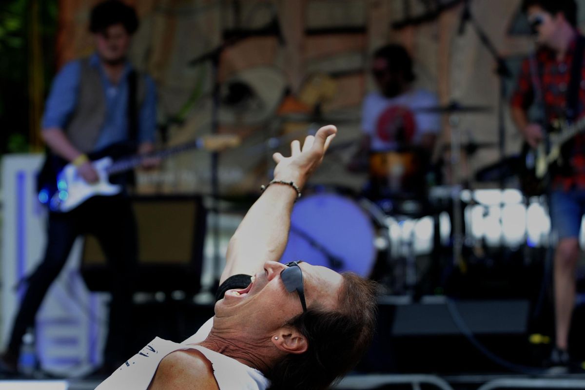 Michael Ransford of Spokane sang along with the band, Pine League, during Elkfest in Browne