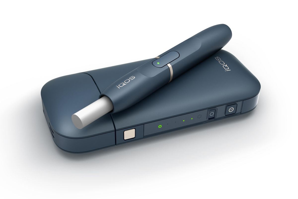 This undated image provided by Philip Morris in January 2018 shows the company’s iQOS product. The device heats tobacco sticks but stops short of burning them, an approach that Philip Morris says reduces exposure to tar and other toxic byproducts of burning cigarettes. (Associated Press)