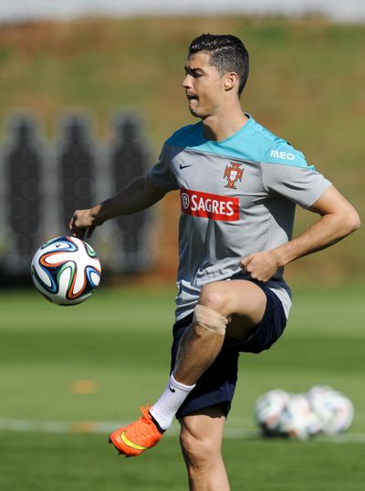 Portuguese soccer star Cristiano Ronaldo has lingering left knee injury. (Associated Press)
