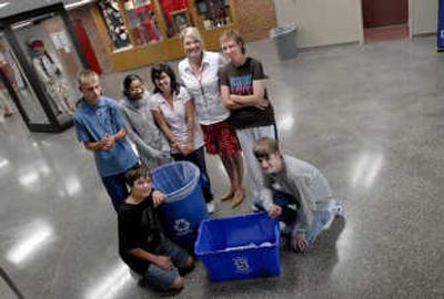 
North Central High School faculty and students are involved in a new recycling project. Top row, from left: Allen Bowman, Amber Johnson, Malia Boatman, Mary O. Gustafson and Shannon Berg. Bottom row, from left, Cameron Finley and Kelly Rossbach.
 (Brian Plonka / The Spokesman-Review)