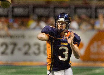 
Friends and family thought he wasn't thinking clearly, but Spokane Shock quarterback Kyle Rowley has proven that he owed football one more shot. 
 (Christopher Anderson / The Spokesman-Review)