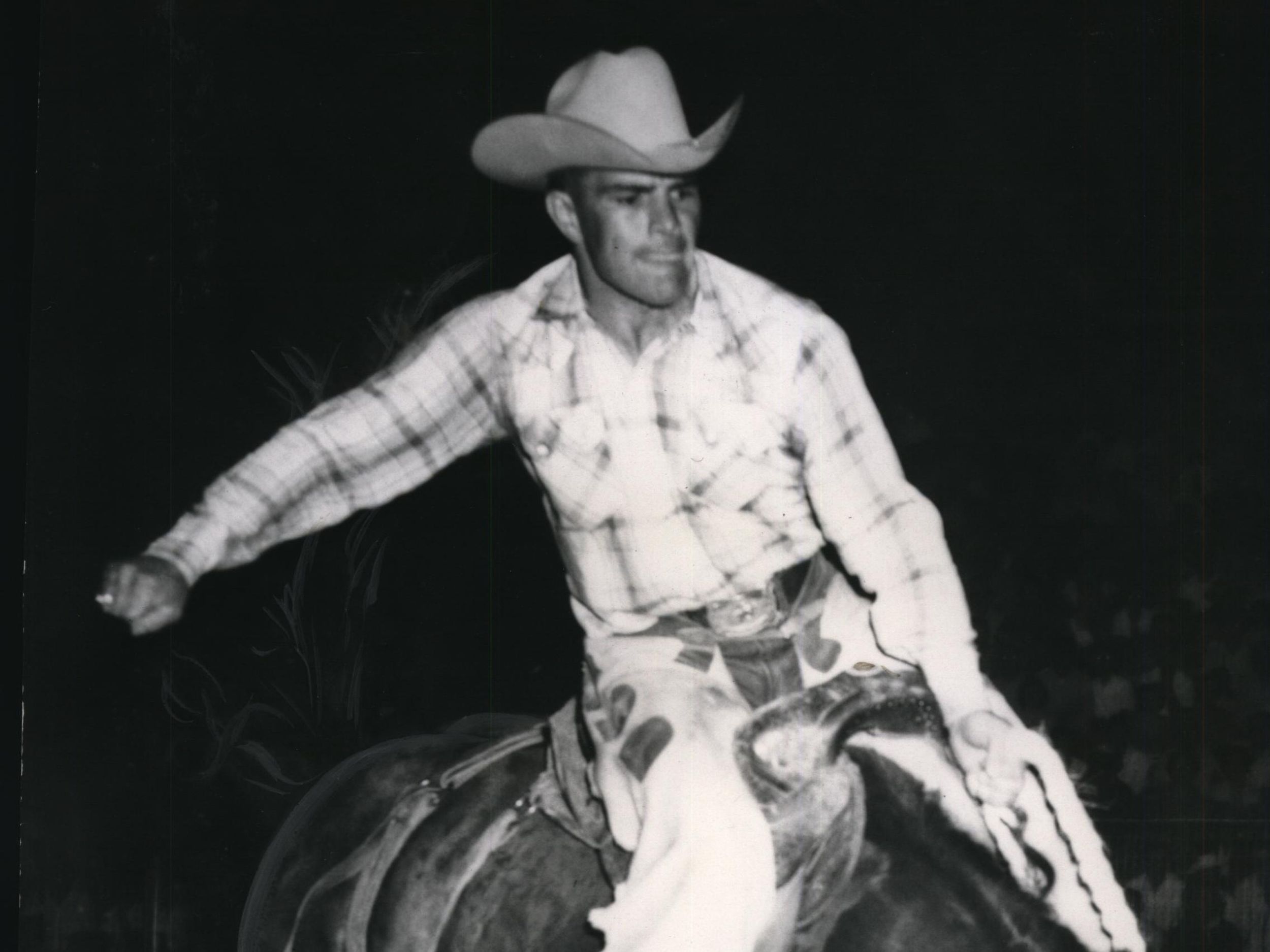 Two cowboys talking in ranch stock photo - OFFSET