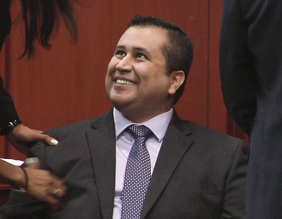 In this image from video, George Zimmerman smiles after the verdict was handed down. (Associated Press)