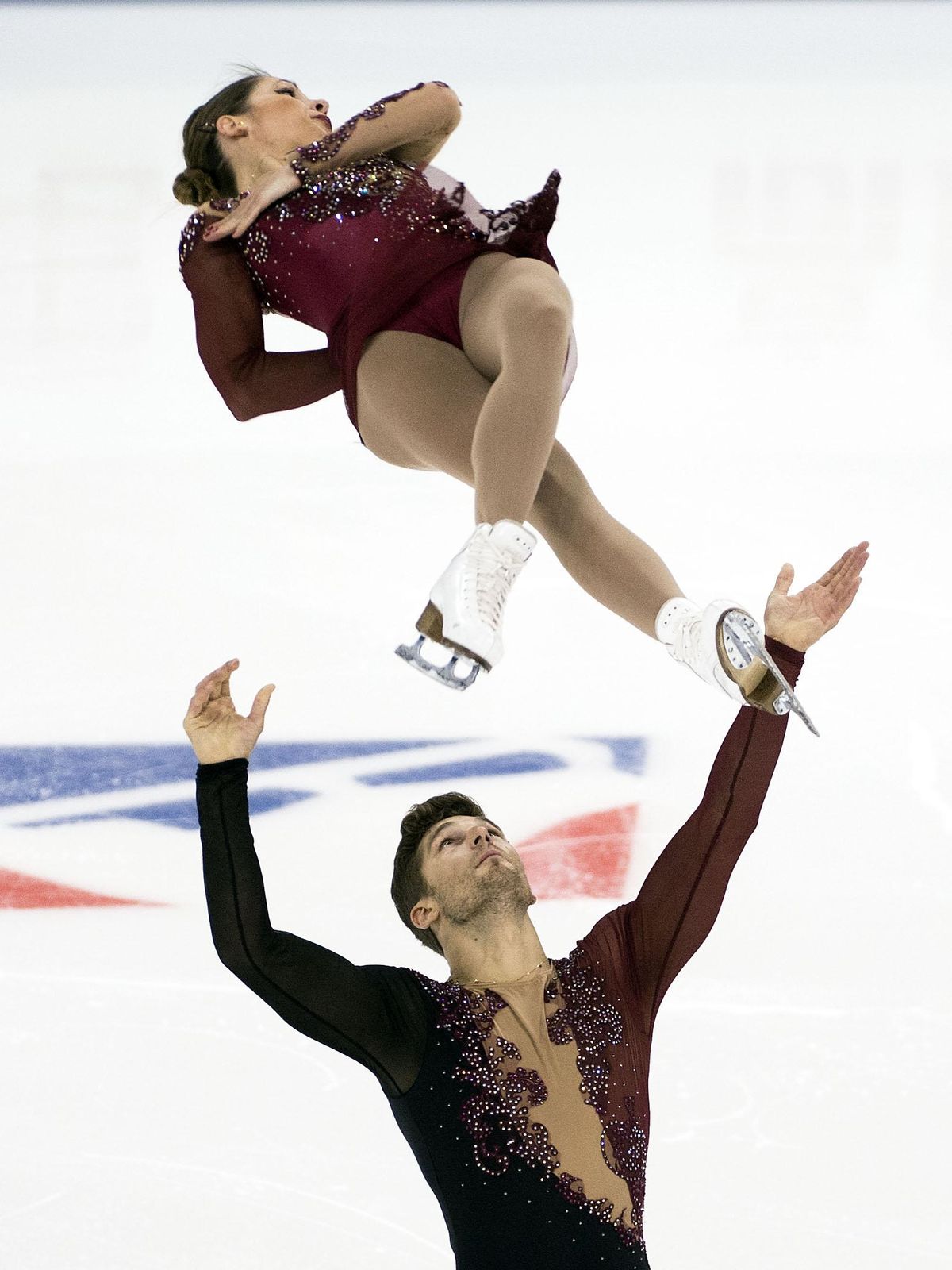 Italians Nicole Della Monica and Matteo Guarise perform a throw during their 2016 Team Challenge Cup pairs free skate program, Sat., April 23, 2016, at the Spokane Arena in Spokane, Wash. (Colin Mulvany / The Spokesman-Review)
