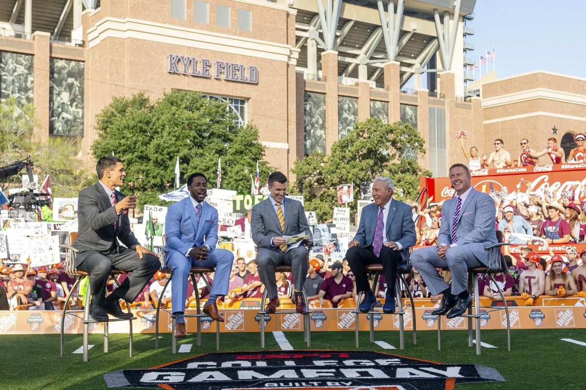 In this Sept. 8 file photo, ESPN College GameDay’s crew sits on set in front of Kyle Field in College Station, Texas, before the start of a  game between Clemson and Texas A&M. After 15 years of the Washington State flag begin a backdrop fixture to every “College GameDay” broadcast, ESPN is going to Pullman on Saturday. (Sam Craft / AP)