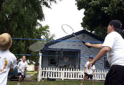 
Janice Smith, 9 (second from left) plays doubles with her brothers Sam, 8 (left), Joseph, 11 (second from right) and Josh, 14. 
 (Jed Conklin / The Spokesman-Review)