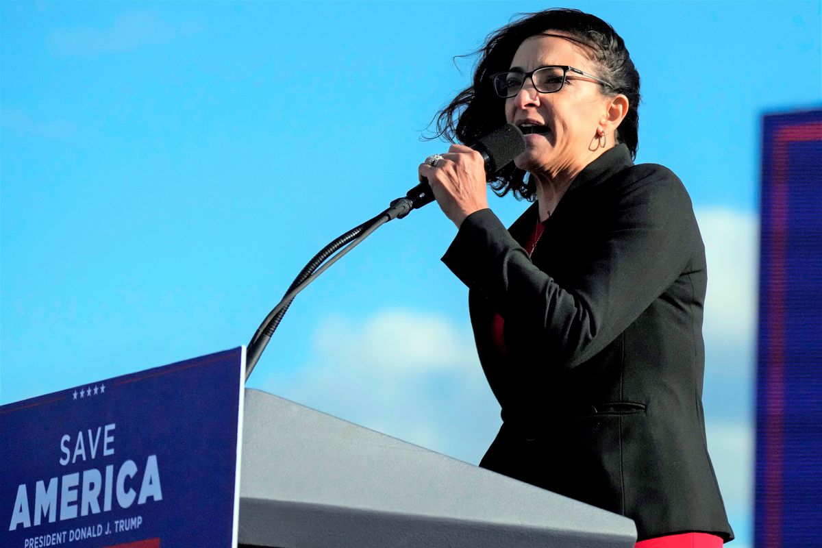 Former South Carolina state lawmaker Katie Arrington speaks at a rally ahead of an appearance by former President Donald Trump on Saturday, March 12, 2022, in Florence, S.C. Arrington — now making a second congressional bid — says a dispute over her access to top-secret government information has been part of a politically motivated smear campaign tied to her support of former President Donald Trump.  (Meg Kinnard)