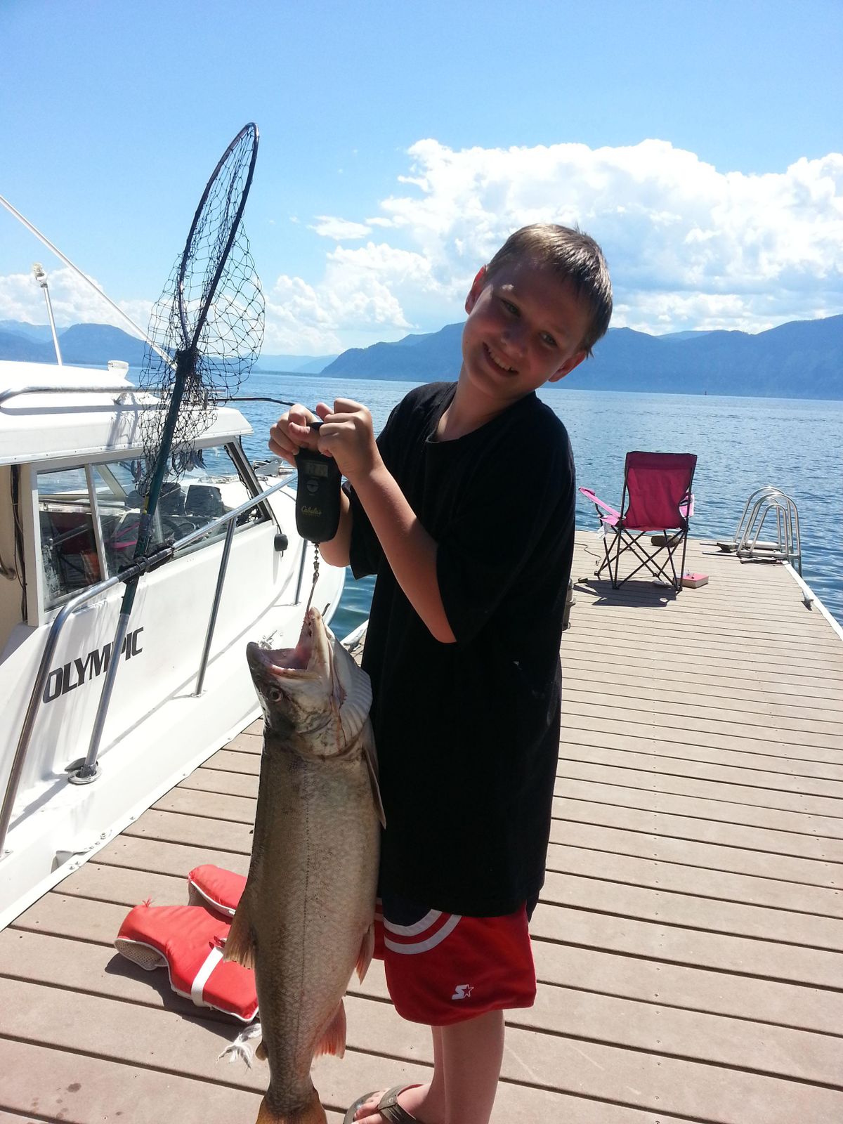 Michel Lancette with this 14-pound lake trout. (COURTESY PHOTO / COURTESY PHOTO)