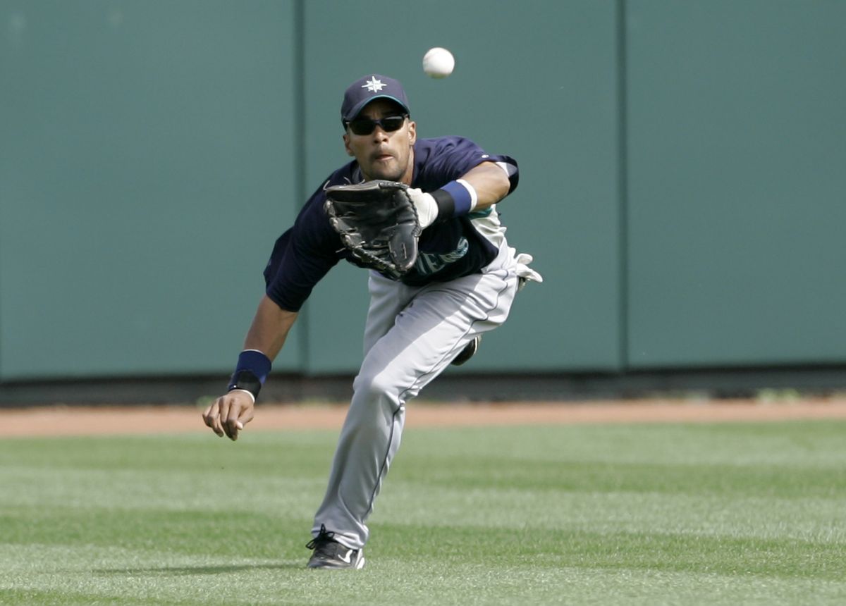 Franklin Gutierrez of the Mariners was brought in for his glove, but he’s swinging a hot bat.  (Associated Press / The Spokesman-Review)