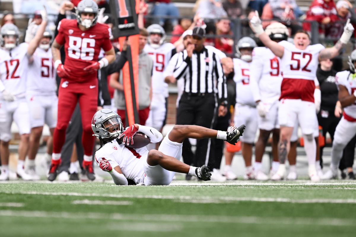 Washington State Cougars safety Jeremiah Bernard (1) intercepts a pass against the offense during WSU’s Crimson and Gray game on Saturday, Apr 25, 2026, on Gesa Field at Martin Stadium in Pullman, Wash.  (Tyler Tjomsland/The Spokesman-Review)