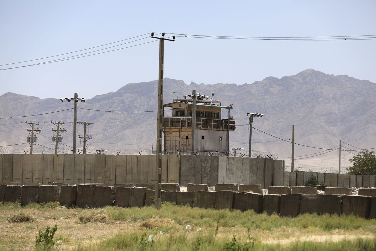 In this June 25, 2021 photo, a wall surrounds Bagram Air Base in Afghanistan. In 2001 the armies of the world united behind America and Bagram Air Base, barely an hours drive from the Afghan capital Kabul, was chosen as the epicenter of Operation Enduring Freedom, as the assault on the Taliban rulers was dubbed. It