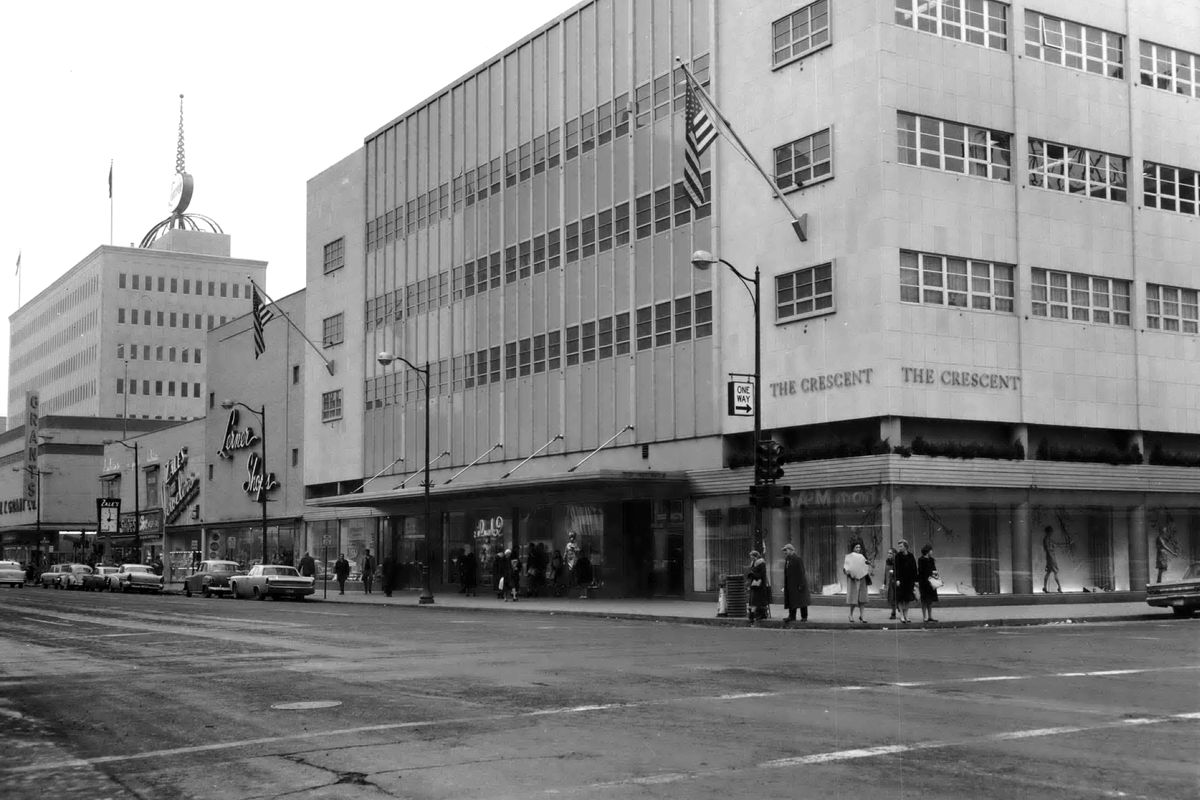 1970s: The busy retail storefronts on the north side of the 700 block of West Riverside Avenue, including the four-story Crescent, were part of the downtown shopping scene at the height of the department store era. These buildings still exist today, but they are dressed in modern siding and architecture. The Crescent store, attached to an even larger building facing Main Avenue, was expanded to include the Wall Street corner after the First National Bank, nicknamed the “marble bank” building, was torn down in 1953.  (The Spokesman-Review Photo Archive)