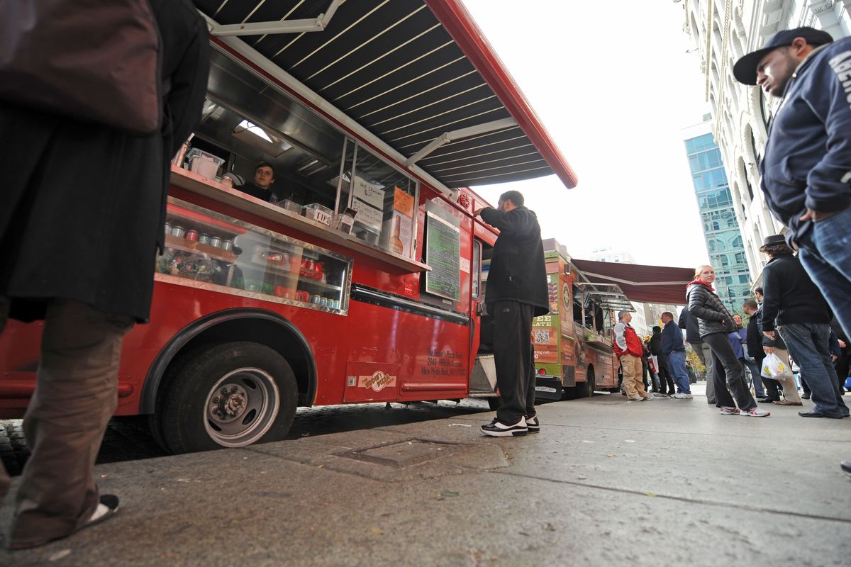 Food trucks service the still powerless Union Square section of Manhattan,Thursday, Nov. 1, 2012, in New York. Three days after superstorm Sandy walloped the city, residents and commuters still faced obstacles as they tried to return to pre-storm routines. (Louis Lanzano / Fr77522 Ap)