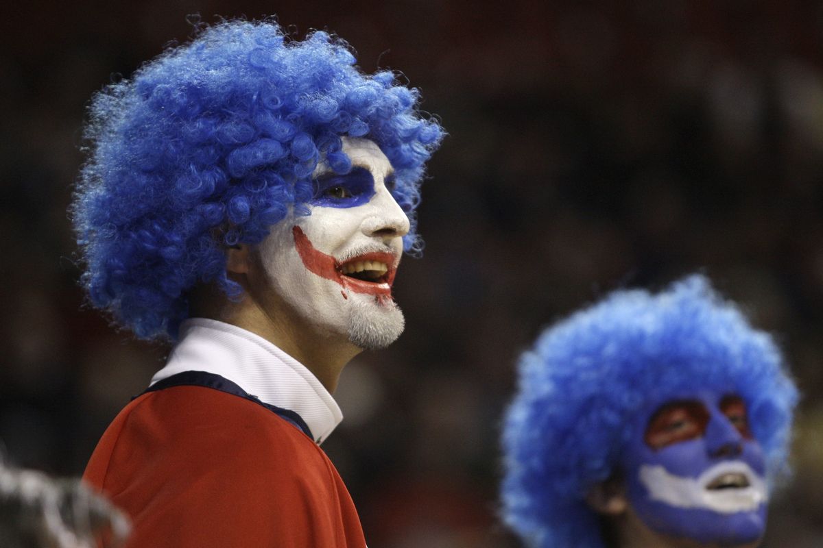 Members of the Gonzaga "Blue Hairs" cheer during an NCAA college basketball game against Davidson, Saturday, Dec. 12, 2009n in Seattle. Gonzaga won 103-91. (Ted Warren / Associated Press)