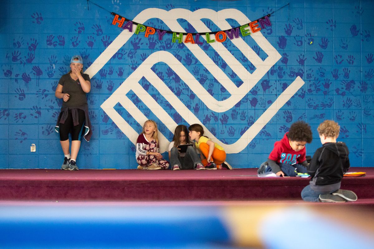Children play during free time at the Northtown Boys & Girls Club in Spokane on Friday Oct. 19, 2018. Proposed changes to Washington’s overtime rules concern the club and other nonprofits. From 3 to 7 p.m. each weekday, children from grades K-12 can play, exercise, do homework and receive supper under supervision of volunteers and Boys & Girls Club staff. (Libby Kamrowski / The Spokesman-Review)