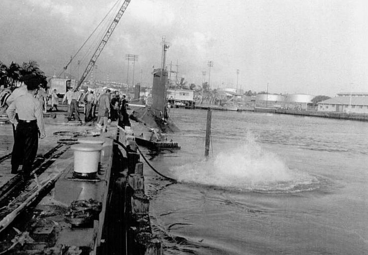 On June 14, 1960, a  rupture in the charging hose caused a violent fire and torpedo explosions in the stern room of the USS Sargo. The oxygen-fueled fire was so intense that part  of the ship had to be submerged, with the hatches open, to extinguish it. Courtesy of Rufus Reeves (Courtesy of Rufus Reeves / The Spokesman-Review)