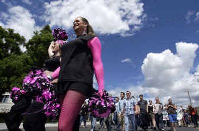 
Members of Dempsey's Weapons of Mass Seduction lead the way down Washington Street toward Riverfront Park on Sunday during the annual Pride Parade in Spokane.
 (Liz Kishimoto / The Spokesman-Review)