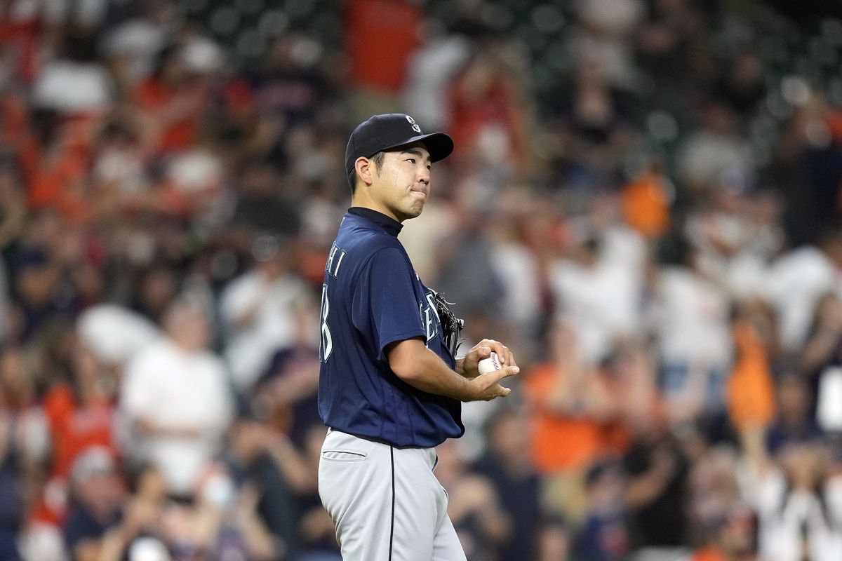 Seattle Mariners starting pitcher Yusei Kikuchi reacts after giving up a home run to Houston Astros