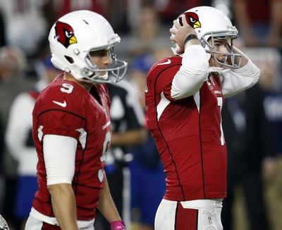 In this Oct. 23, 2016, file photo, Arizona Cardinals kicker Chandler Catanzaro (7) reacts after missing a field goal as punter Ryan Quigley (9) looks on during overtime of an NFL football game against the Seattle Seahawks in Glendale, Ariz. The game ended in a 6-6 tie. (Ross D. Franklin / Associated Press)