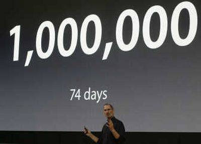 Apple CEO Steve Jobs announces the long-awaited start of iPhone for the German market on Wednesday. Apple Inc.'s iPhone will go on sale in Germany on Nov. 9 and have the T-Mobile network as its exclusive carrier. The screen in the back displays that Apple has sold 1,000,000 iPhones in 74 day's. Associated Press
 (Associated Press / The Spokesman-Review)