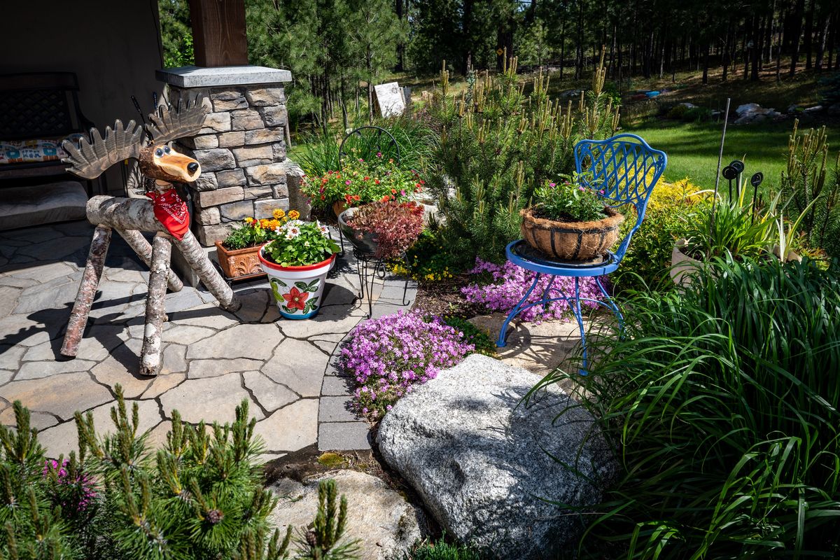 Joe Laynor plants with deer and other wildlife in mind. His yard will be featured in the Spokane in Bloom garden tour.  (COLIN MULVANY/THE SPOKESMAN-REVI)