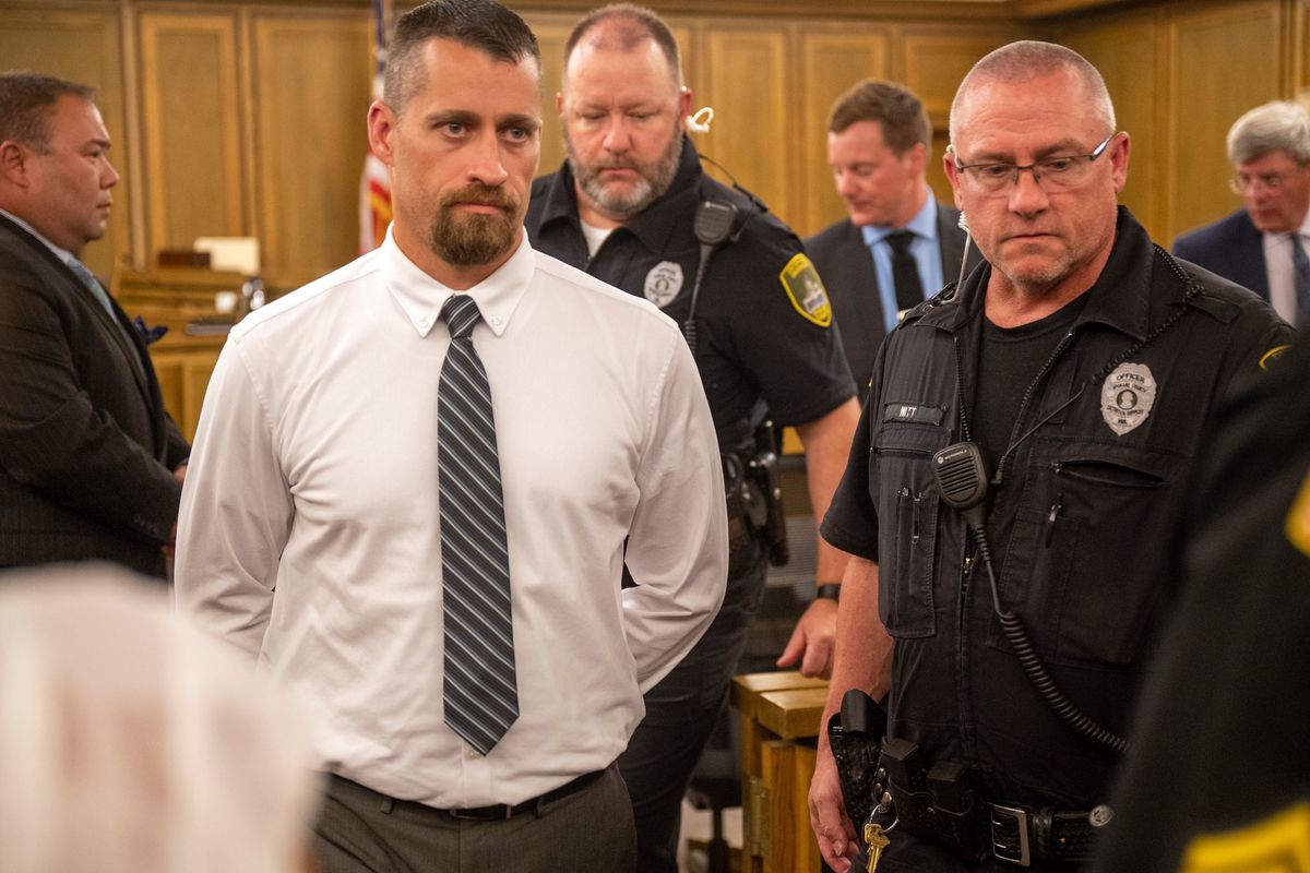 Former Spokane police Officer Nathan Nash is led out of Spokane County Superior Court on Tuesday after a jury found him guilty of two counts of rape.  (Jesse Tinsley/The Spokesman-Revi)