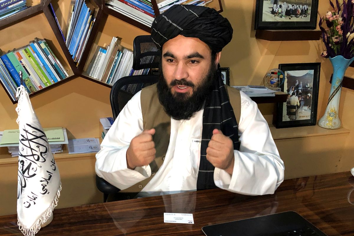 Education Ministry spokesman Mawlvi Aziz Ahmad Rayan speaks during an interview with The Associated Press in Kabul, Afghanistan, Wednesday, March 23, 2022. Afghanistan