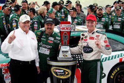 
Dale Earnhardt Jr. celebrates his LifeLock 400 victory with team owner Rick Hendrick, left, and crew chief Tony Eury Jr.Associated Press
 (Associated Press / The Spokesman-Review)