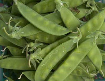 
Pea pods are among the offerings at area farmers' markets.
 (File/ / The Spokesman-Review)