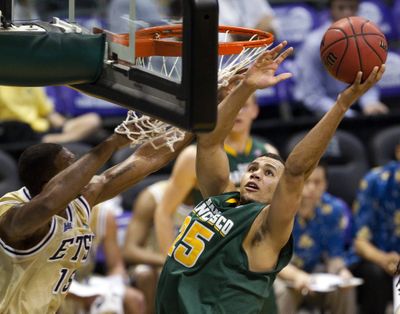 USF’s Cole Dickerson averages double-double. (Associated Press)