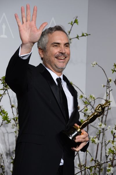 Alfonso Cuaron won two Academy Awards on Sunday for the film “Gravity.” (Associated Press)