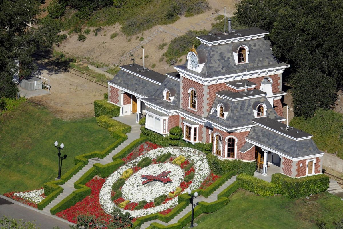 The train station at Neverland Ranch,  shown in Los Olivos, Calif., Wednesday, July 1, 2009, colorful shrubs depict a floral clock with the word “Neverland.” (Chris Carlson / Associated Press)