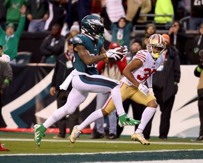 Eagles running back Miles Sanders scores a touchdown against San Francisco during the NFC Championship game on Sunday at Lincoln Financial Field in Philadelphia.  (Tribune News Service)