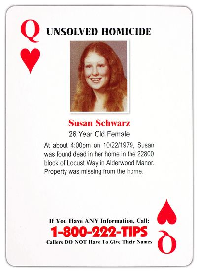 A queen of hearts playing card shows a photo of Susan Schwarz. (Associated Press)