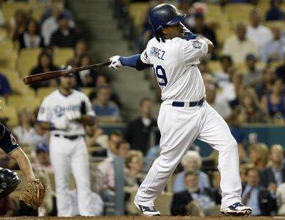 World Series MVP in 2004, Manny Ramirez has hit .350 during his last 43 postseason games.  (Associated Press / The Spokesman-Review)