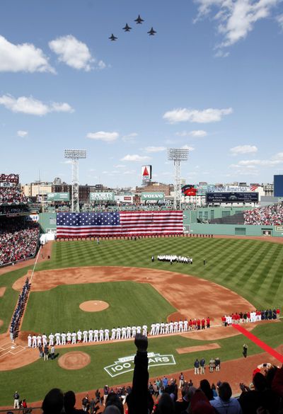 Fighter jets fly over Fenway Park before Friday’s season opener. (Associated Press)
