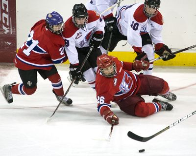 Spokane Chiefs forward Kailer Yamamoto (21) has been named to the U.S. roster for the World Under-17 Hockey Challenge. (Dan Pelle)