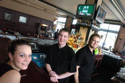 
Laura Culver, Tyler Geigle and Joey Toews staff the bar at The Beacon, a new pub at Sherman Avenue and Fourth Street  in Coeur d'Alene. 
 (Jesse Tinsley / The Spokesman-Review)
