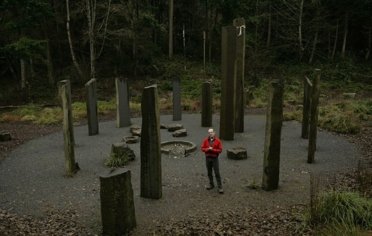 Chuck Pettis, Earth Sanctuary founder, stands for his portrait inside the Cottonwood Stone Circle that is located in the center of his 72-acre nature reserve and spiritual retreat center near Freeland on Whidbey Island. Seattle Times (Photos by Erika Schultz Seattle Times / The Spokesman-Review)
