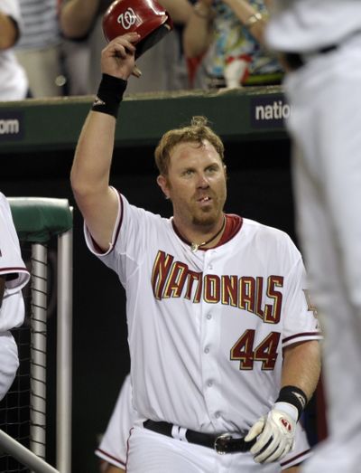 Washington’s Adam Dunn hit two home runs, drove in three in victory over Giants.
