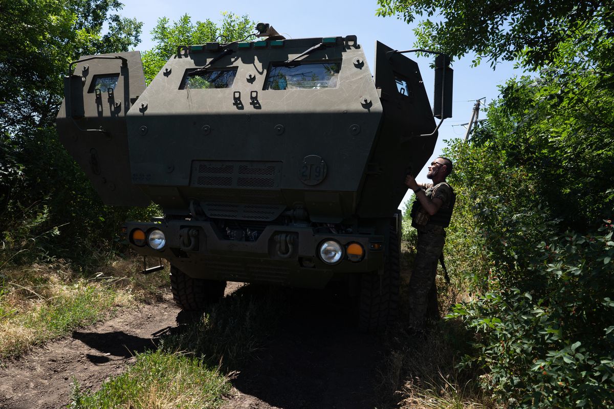 A Ukrainian serviceman opens the door to an HIMARS vehicle in Eastern Ukraine on July 1. MUST CREDIT: Photo for The Washington Post by Anastasia Vlasova  (Anastasia Vlasova/For The Washington Post)