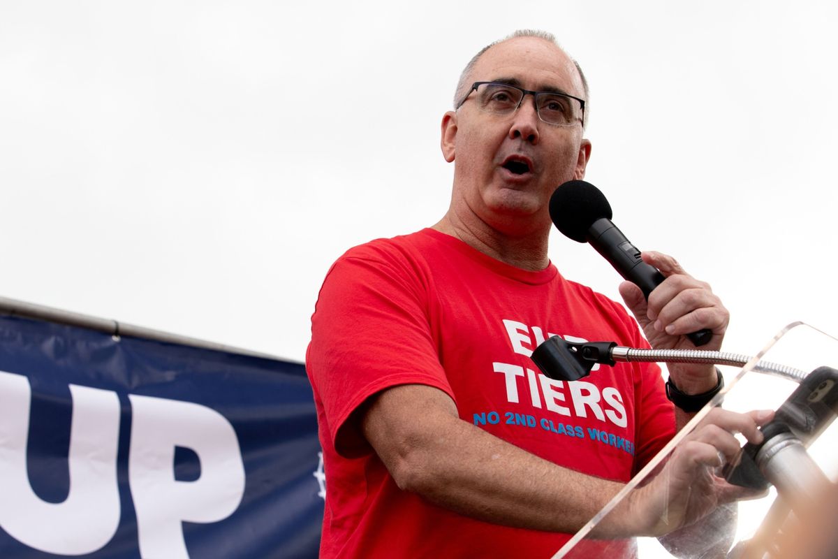 UAW President Shawn Fain speaks to the crowd during a rally in Detroit on Sept. 15.  (Emily Elconin/Bloomberg)